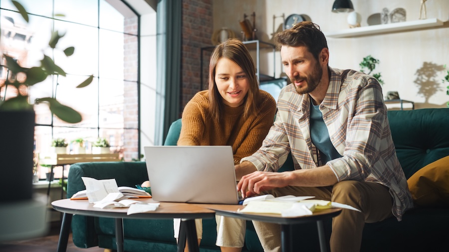 Couple filling out rebate forms online