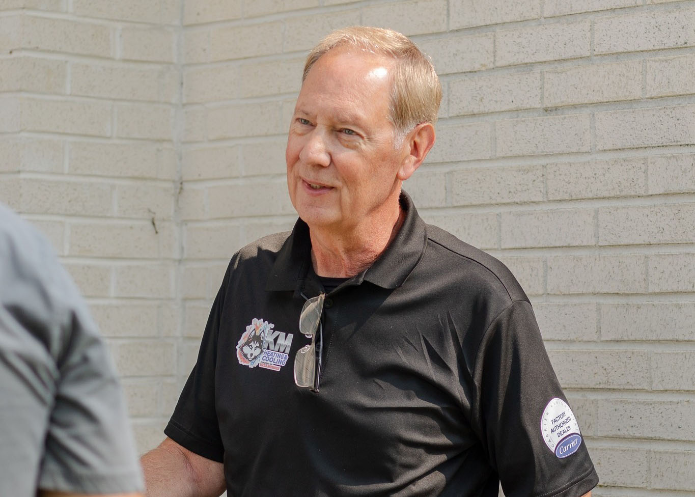 Dave Kissel at a homeowners house greeting the customer. He's there for a maintenance check.
