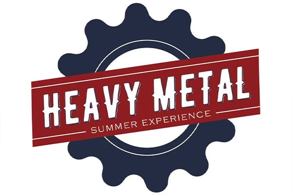 graphic of a gear with the word heavy metal summer experience on top of gear