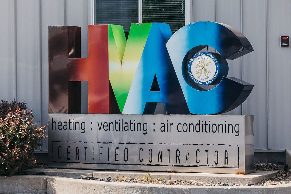 km heating and cooling hvac signage