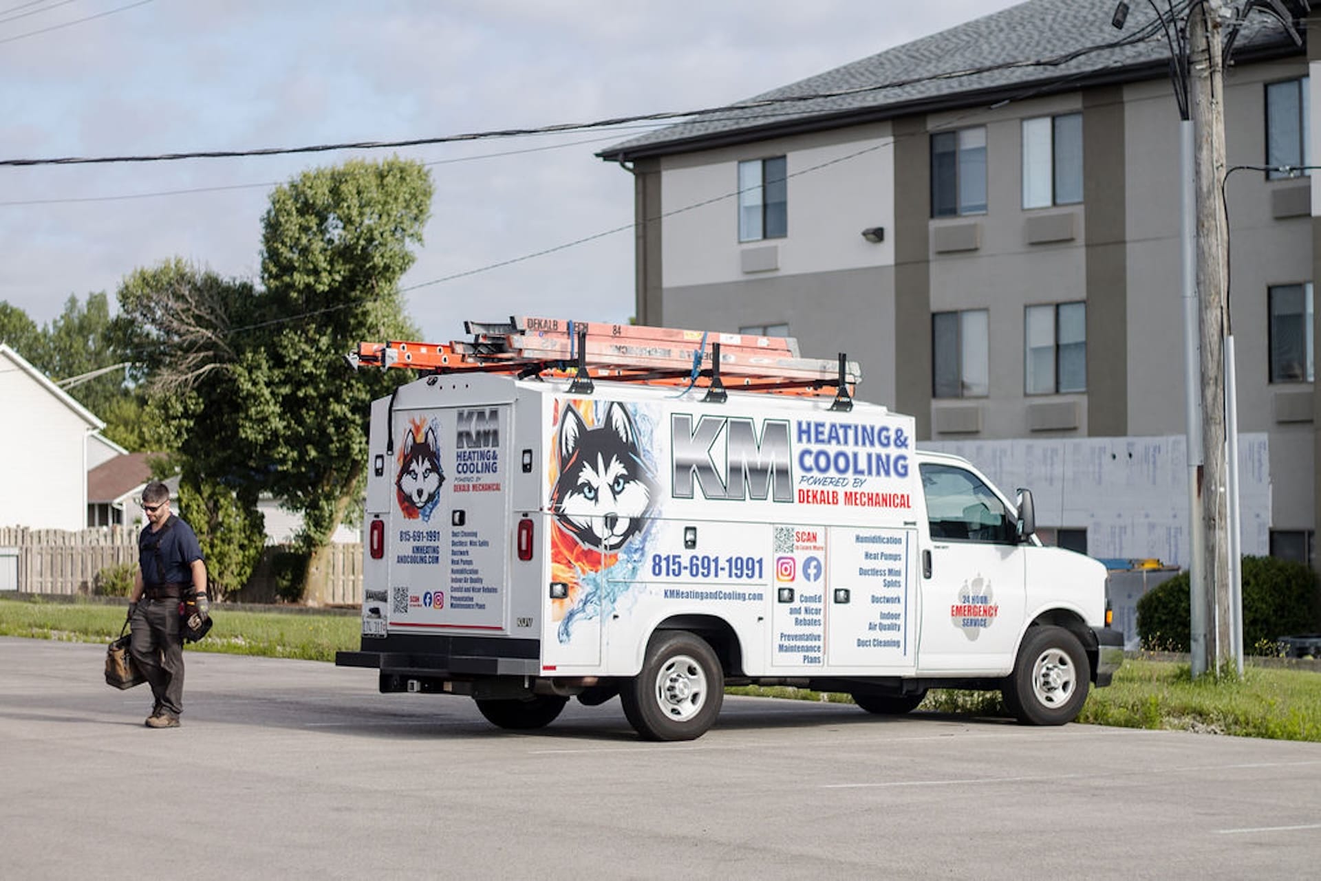 Header image of KM Heating and Cooling truck.